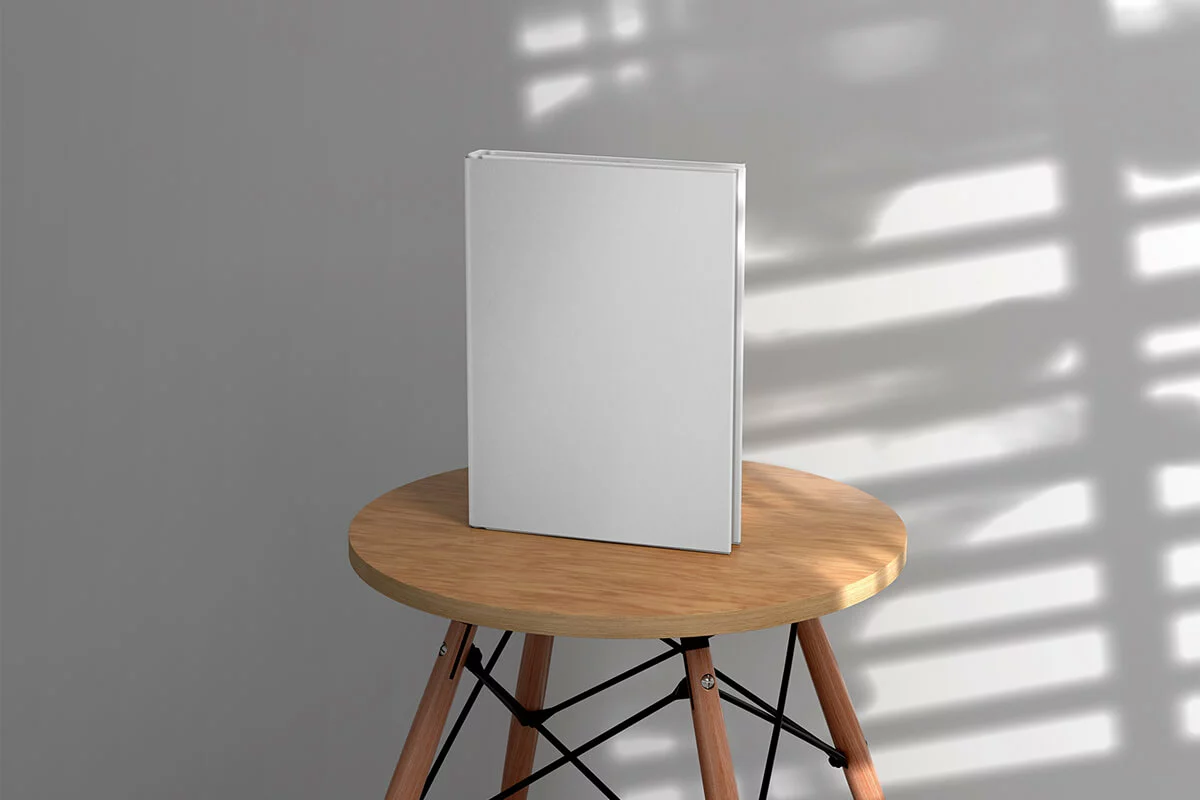 Free Hardcover Book on Wooden Stool Mockup Preview 2