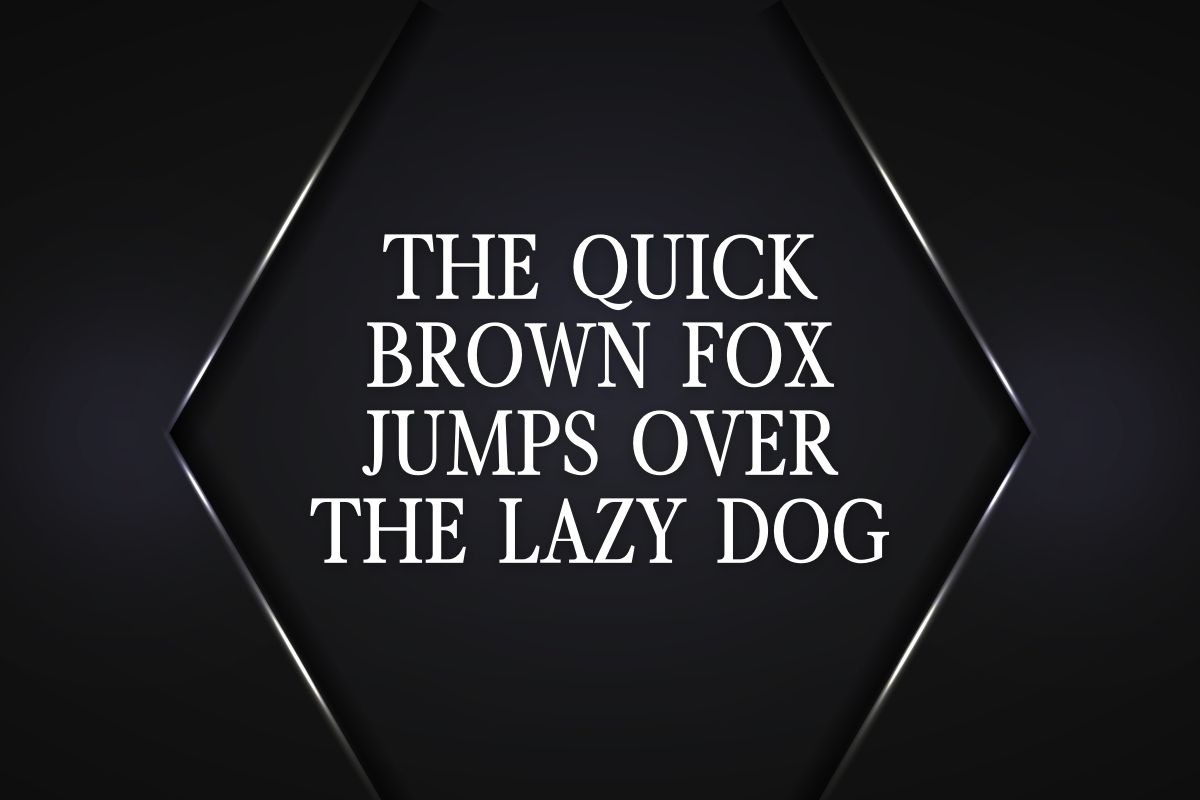 Graphic design display of the alphabet sentence 'THE QUICK BROWN FOX JUMPS OVER THE LAZY DOG' on a black diamond-shaped background.